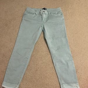 Greenish blue jeans